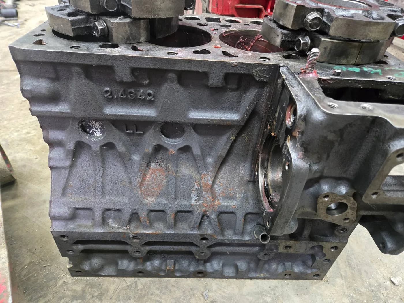 Kubota V2403 cylinder block casting numbers with the main bearing caps removed