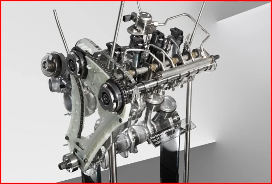 Failed BMW N20 timing chain and worn guide rails removed from a 2013 X3 at our Edmonton shop