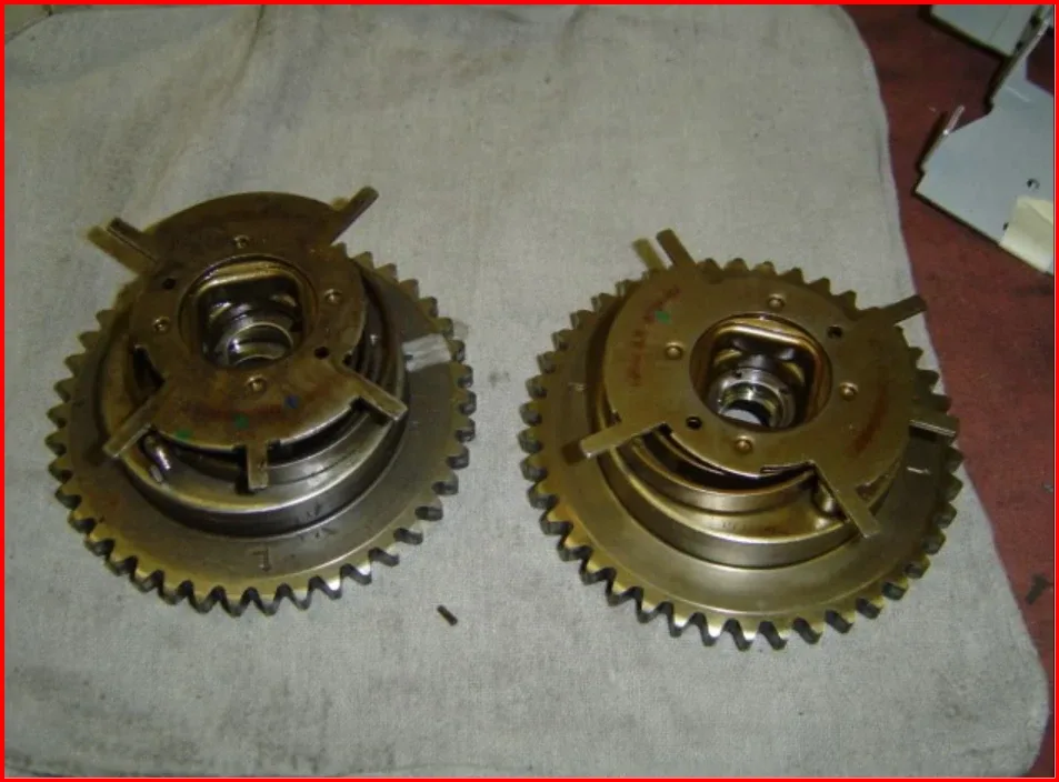 Worn Ford 5.4 Triton cam phaser removed during a timing job at our Edmonton shop